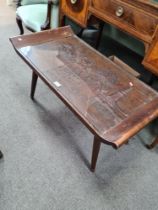 An oriental coffee table and a box of decorative hand bells