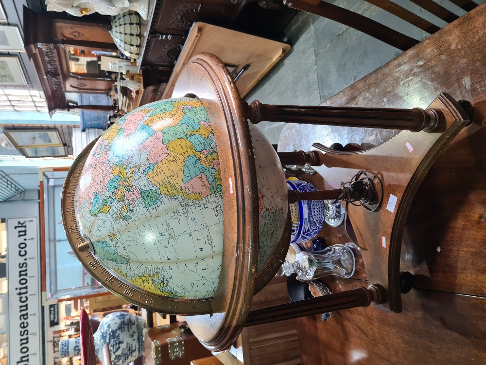 A reproduction illuminated globe on wooden stand, height 78cms - Image 4 of 5