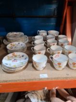 A vintage Royal Albert part tea set, buttercup design including 12 cups and saucers