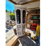 A reproduction painted standing corner display cabinet