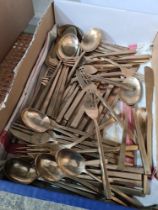 A quantity of Thai brass plated cutlery