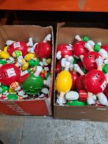 M & M's, two boxes of figure dispensers medium and small examples, mainly holding Easter eggs and pr