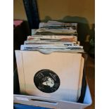 Vinyl; A box of vinyl 45s singles of various artists and genres