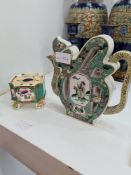 A Chinese teapot having pierced body and a Derby style inkwell