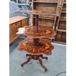 A 19th Century Dutch marquetry folding three tier whatnot having floral decoration, open height 112.