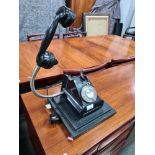 An old Bakelite telephone converted to lamp