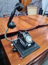 An old Bakelite telephone converted to lamp