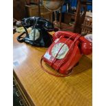 An old red telephone and one other black example