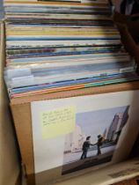 A box of Rock and Pop vinyl LPs from the 1970s and 80s including Queen, The Beatles and Pink Floyd