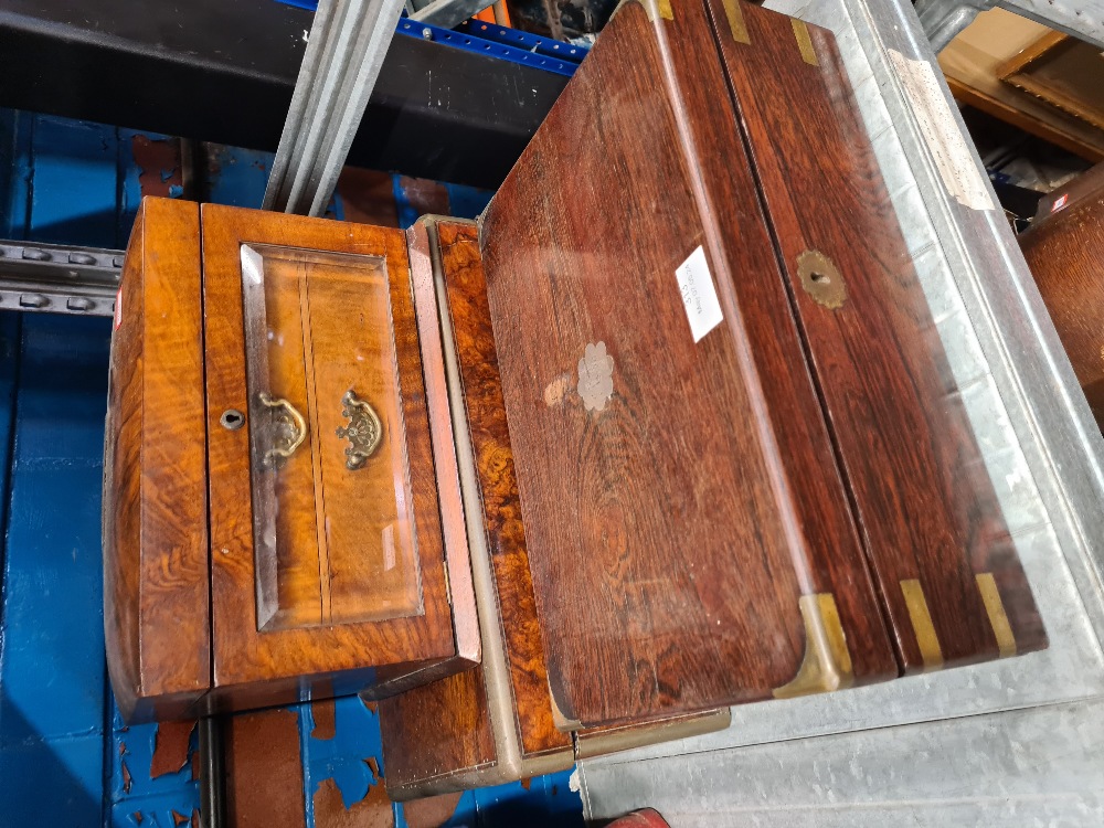 Three wool and inlaid boxes one having a bevelled glass viewing panel to the front