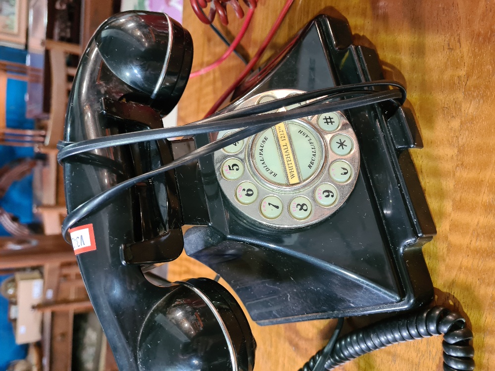 An old red telephone and one other black example - Image 2 of 3