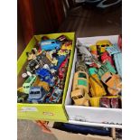 Two small trays of vintage playworn Dinky toys and others