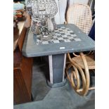 A marble pedestal table having square top with chess board centre, 66cms