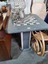 A marble pedestal table having square top with chess board centre, 66cms