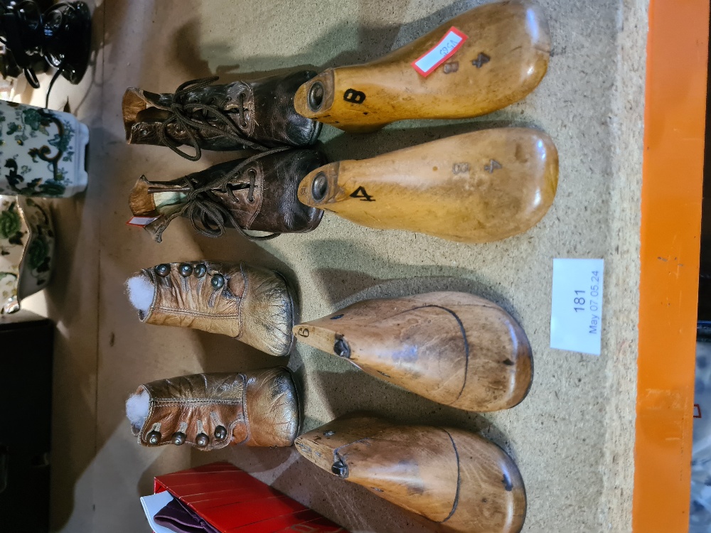 Two pairs of Edwardian leather children's shoes and two pairs of child's shoe lasts