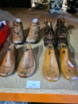 Two pairs of Edwardian leather children's shoes and two pairs of child's shoe lasts