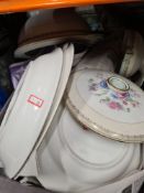 A selection of 'Limoges' plates, lidded dishes, etc