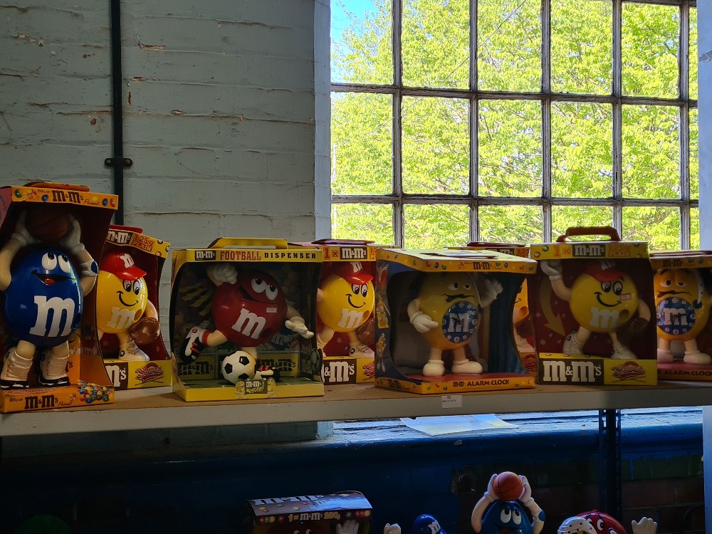 M & M's, a collection of large figure dispensers, all boxed to include alarm clocks