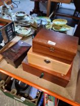 A selection of wooden boxes including a tea caddy