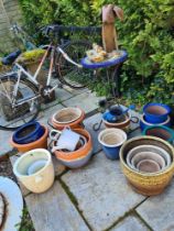 A quantity of glazed garden pots and sundry