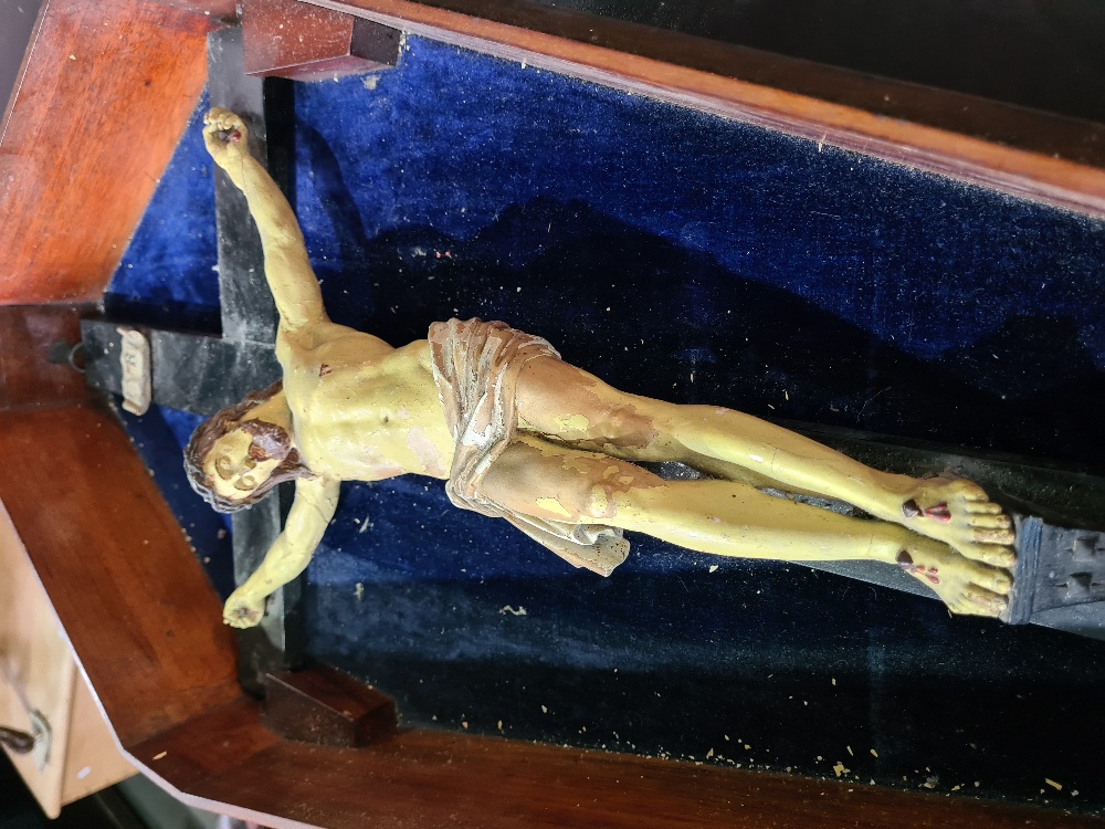 A circa 1900 painted wooden figure of Jesus on Cross in fitted coffin shaped mahogany box, length 86 - Image 2 of 3