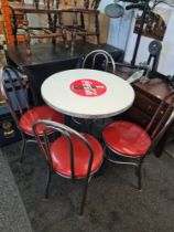 A 1950s style Coca Cola circular table and 4 tubular chrome chairs by Vitro, St Louis