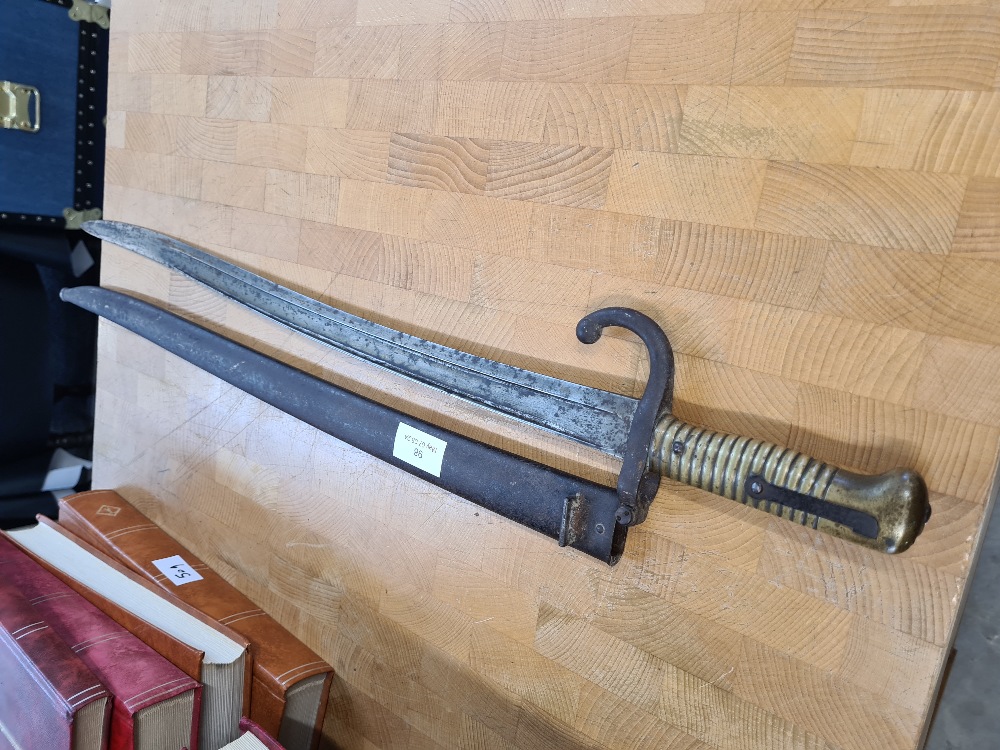 Late 19th Century bayonet with iron scabbard