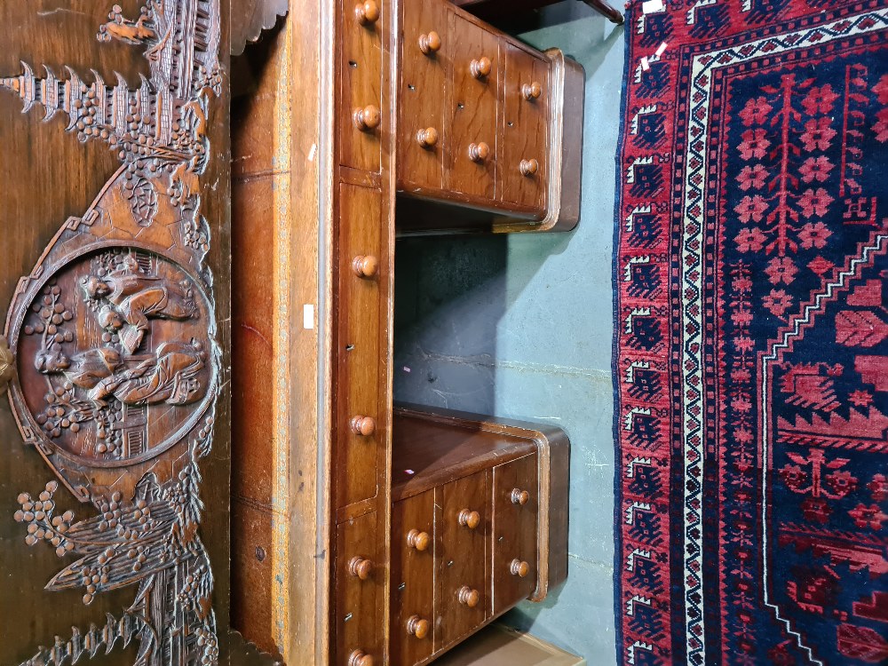 A late Victorian oak twin pedestal desk having nine drawers, 121.5cms