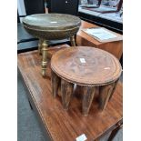 A brass stool having floral top and one other stool