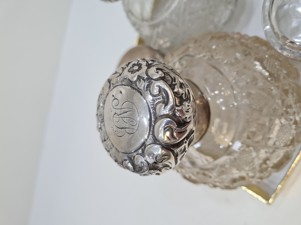 Silver topped dressing table items comprising silver topped pretty cut glass scent bottles and other - Image 4 of 7