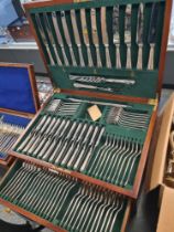 A large canteen of plated cutlery by James Dixons & Sons, Sheffield, with lower drawer