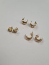 Three pairs of 9ct gold earrings, to include 2 hoops, and a pair of domed struts with textured surfa