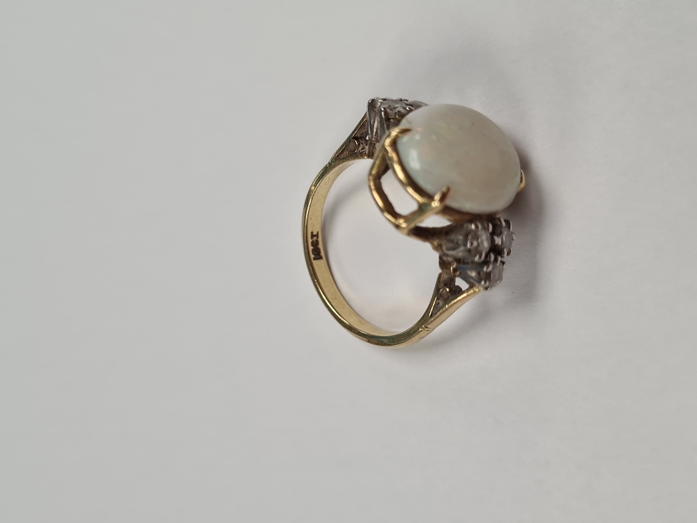 18ct yellow gold dress ring with large central white opal, each side supported 3 round cut claw moun - Image 2 of 5