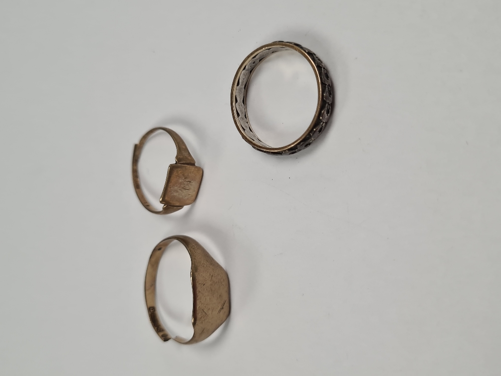 Two 9ct yellow gold signet rings, both AF, cut, approx 3.68g and a 9ct and silver eternity ring appr