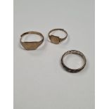 Two 9ct yellow gold signet rings, both AF, cut, approx 3.68g and a 9ct and silver eternity ring appr
