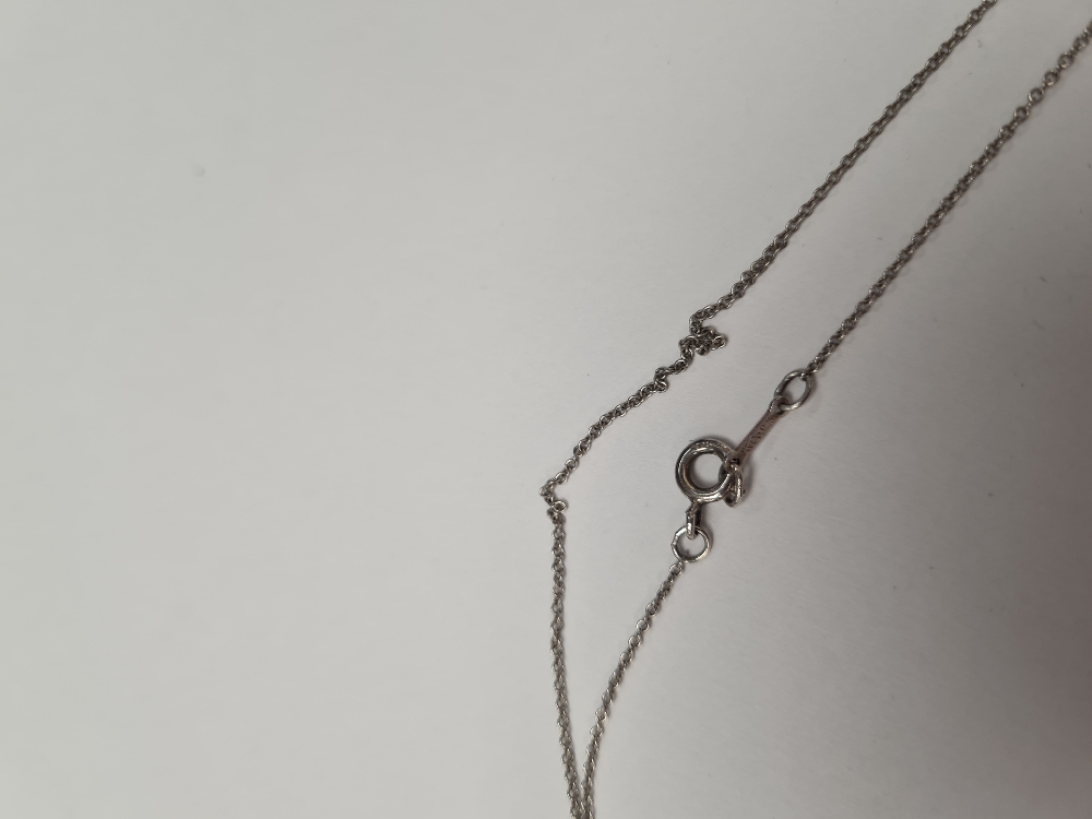 Tiffany & Co; A Sterling Sivler neckchain hung with Elsa Peretti small silver cross? - Image 4 of 6