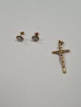 9ct yellow gold Crucifix pendant, and a pair of 9ct gold cubic zirconia set earrings, crucifix marke
