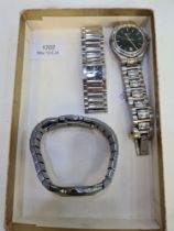 Three designer watches; a stainless steel Gucci 9040, 0054677 watch with black dial, a Titanium Rado