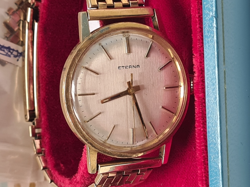 Eterna; A 9ct yellow gold gents Eterna watch on 9ct yellow gold strap, silvered dial, baton markers, - Image 2 of 5