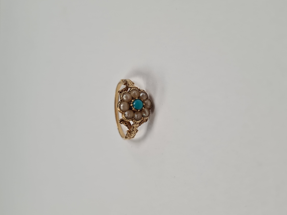 Antique yellow gold daisy ring with central turquoise surrounded seed pearls on foliate shoulders, u