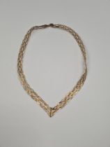 9ct tin coloured gold flatlink plaited neckchain, marked 375, maker A C, approx 8g