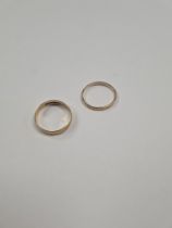 Two 9ct yellow gold wedding bands, sizes Q & N