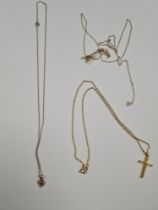 Four fine 9ct gold neckchains including one hung with 9ct yellow gold cross pendant, all marked 4.62