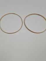 Two 9ct yellow gold bangles, both approx 6.5cm diameter, both marked 375, approx 6.48g