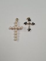 9ct gold cross pendant set with sapphires and diamond chips, and another 9ct gold baked pearl set pe