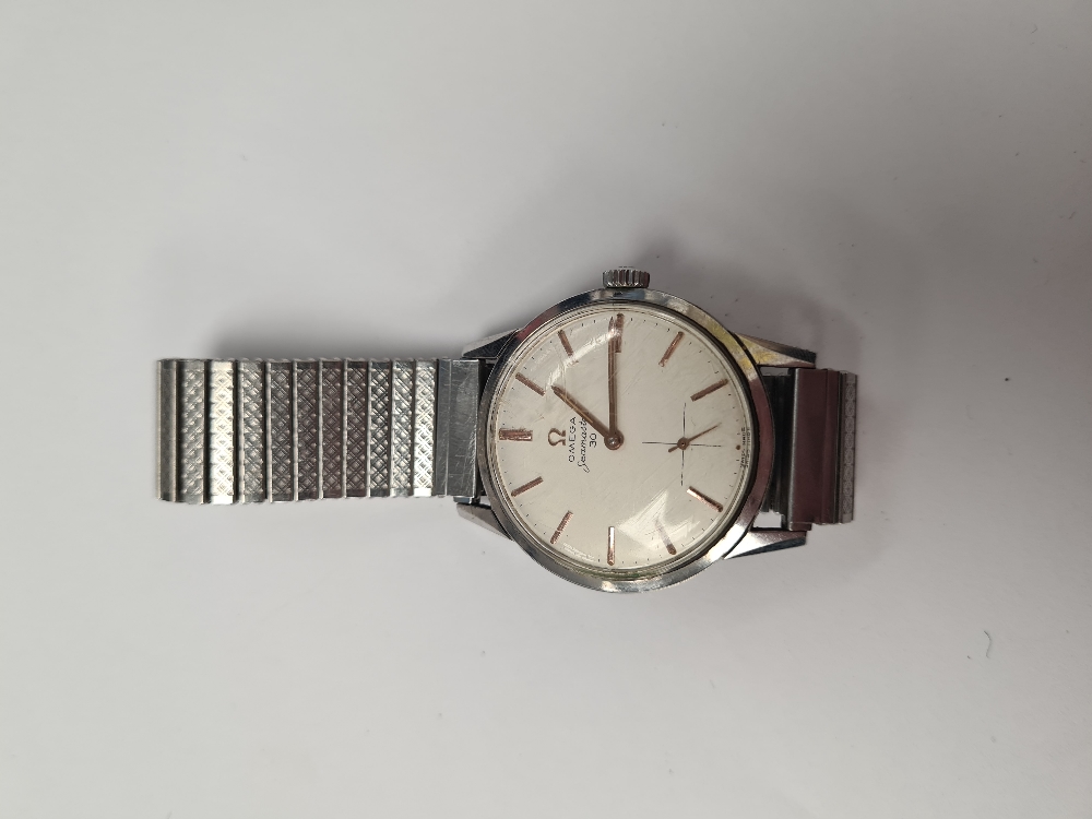 Omega; A vintage 'Omega' Seamaster 30 watch with cream dial and rose gold baton markers, hands and s