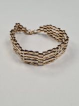 9ct yellow gold 5 bar gatelink bracelet, with safety chain, marked 375, London Import marks, 9g appr