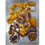 Selection of amber and amber style jewellery, some Baltic amber in silver mounts including brooch, p