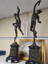 After Jean de Bologne, a large pair of patriated bronze figures of Mercury and one other blowing a t