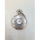 A silver half hunter pocket watch by Aaron Lufkin Dennison. The back having central vacant cartouche